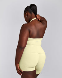 SoftMotion™ Halter Neck Vest with Built in Bra Shelf with Grey Logo | Pastel Yellow