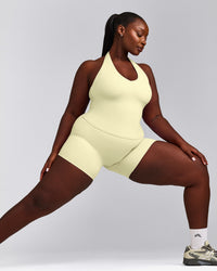 SoftMotion™ Halter Neck Vest with Built in Bra Shelf with Grey Logo | Pastel Yellow