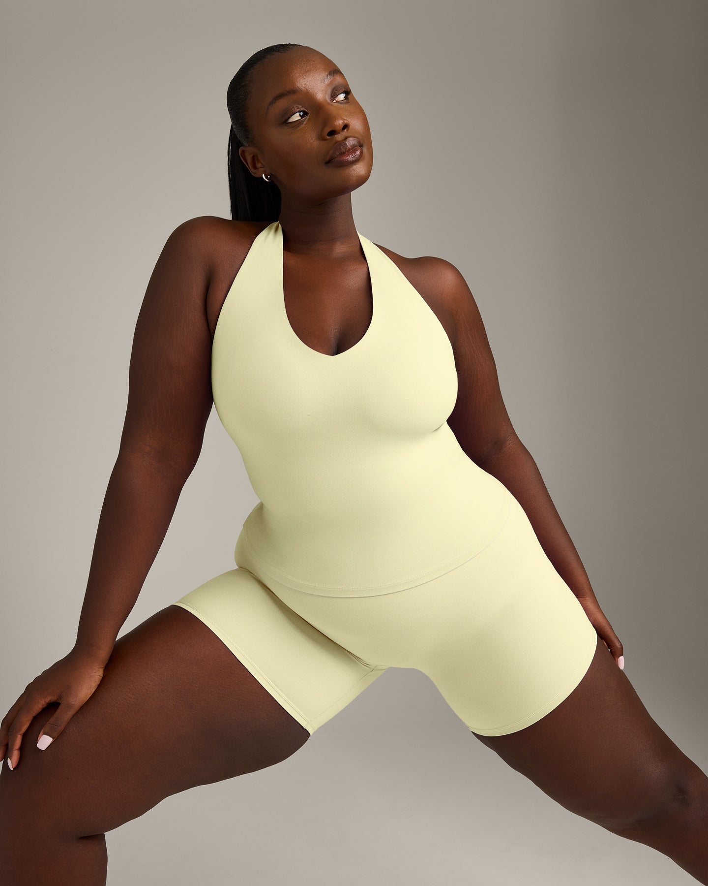 SoftMotion™ Halter Neck Vest with Built in Bra Shelf with Grey Logo | Pastel Yellow