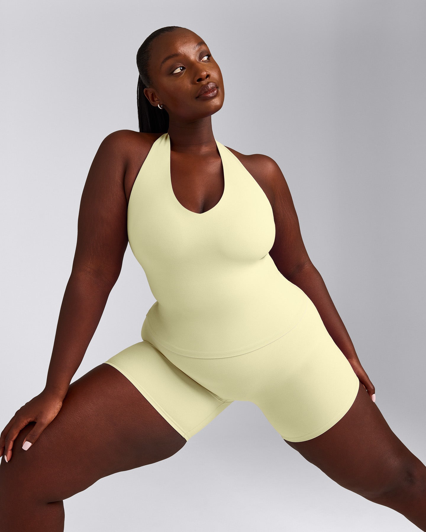 SoftMotion™ Halter Neck Vest with Built in Bra Shelf with Grey Logo | Pastel Yellow