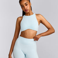 SoftMotion™ High Neck Sports Bra with Grey Logo |  Cloud Blue