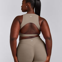 SoftMotion™ High Neck Sports Bra with Grey Logo | Minky