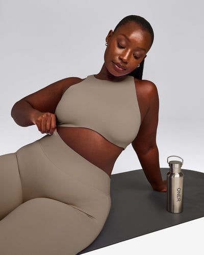 SoftMotion™ High Neck Sports Bra with Grey Logo | Minky