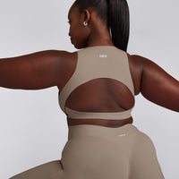 SoftMotion™ High Neck Sports Bra with Grey Logo | Minky