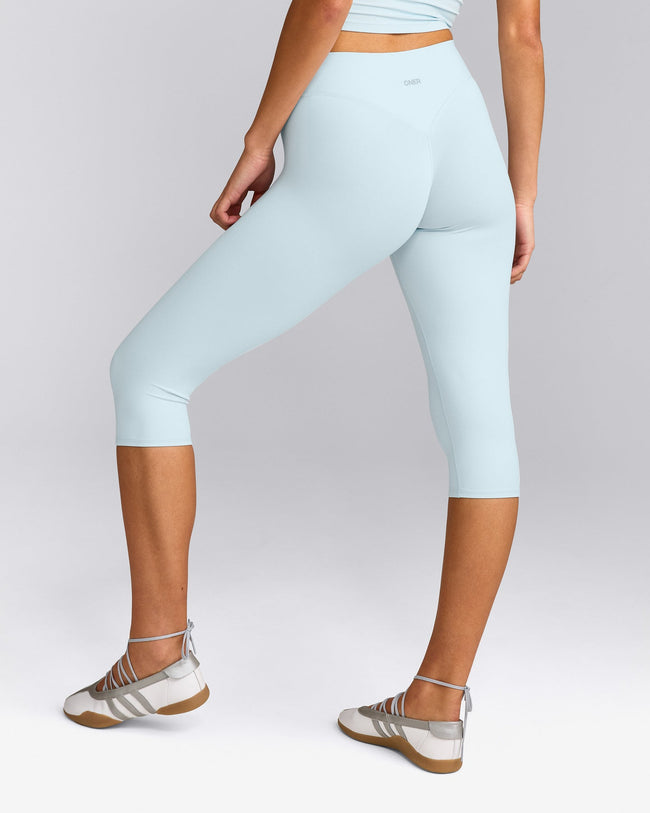 SoftMotion™ High Waisted Capri Leggings with Grey Logo | Cloud Blue