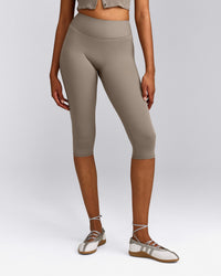 SoftMotion™ High Waisted Capri Leggings with Grey Logo | Minky
