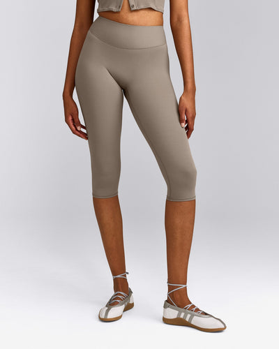 SoftMotion™ High Waisted Capri Leggings with Grey Logo | Minky