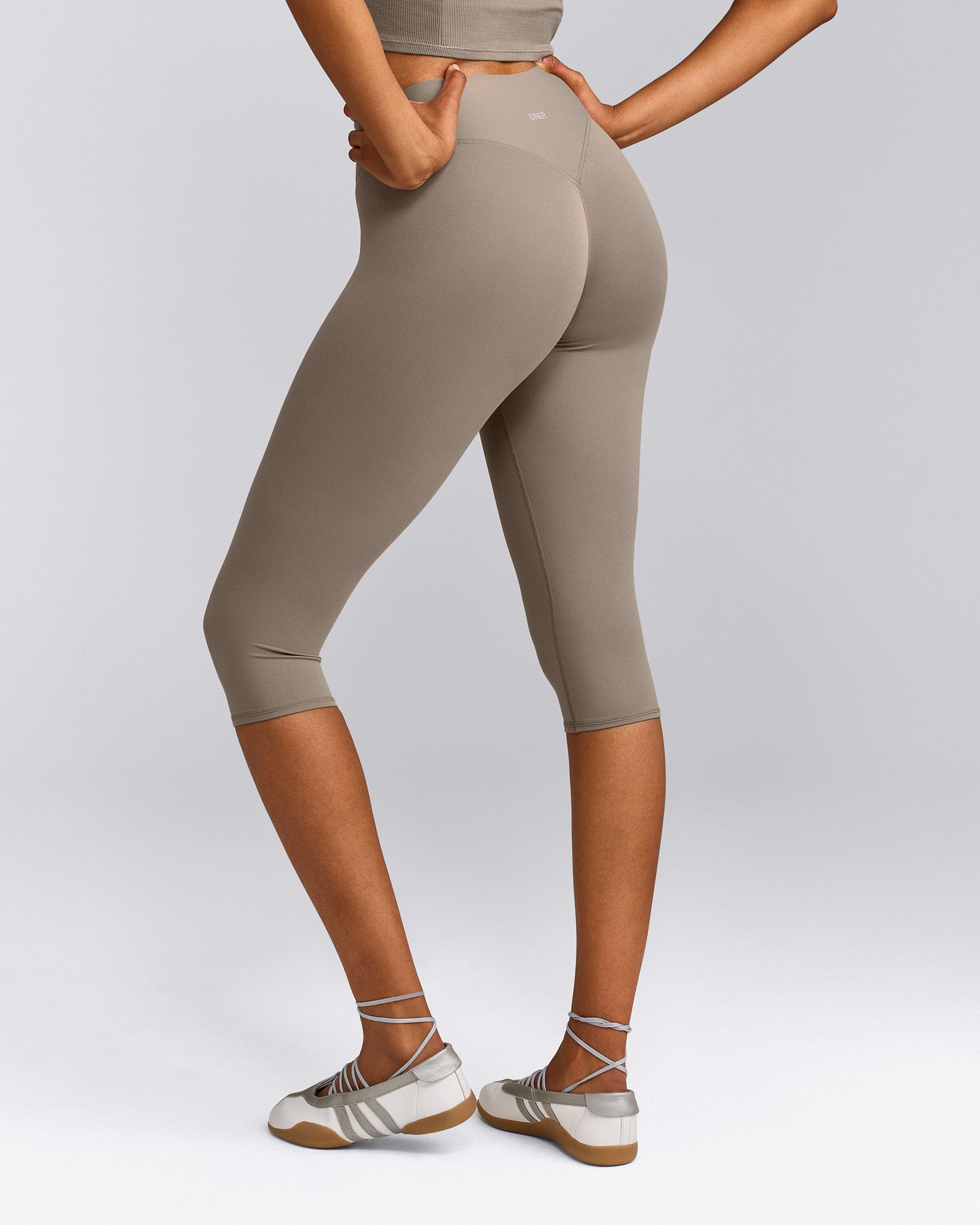 SoftMotion™ High Waisted Capri Leggings with Grey Logo | Minky