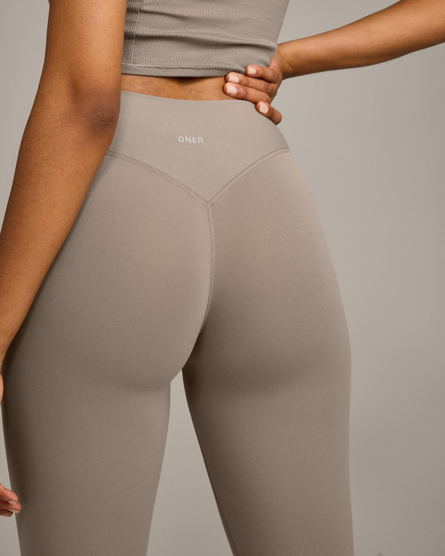 SoftMotion™ High Waisted Capri Leggings with Grey Logo | Minky