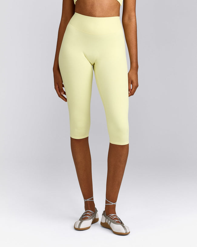 SoftMotion™ High Waisted Capri Leggings with Grey Logo | Pastel Yellow