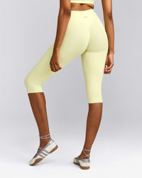 SoftMotion™ High Waisted Capri Leggings with Grey Logo | Pastel Yellow