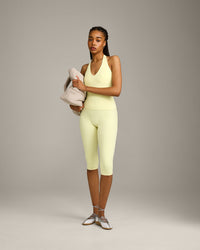 SoftMotion™ High Waisted Capri Leggings with Grey Logo | Pastel Yellow