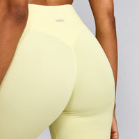 SoftMotion™ High Waisted Capri Leggings with Grey Logo | Pastel Yellow