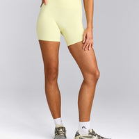 SoftMotion™ High Waisted Shorts 6" with Grey Logo | Pastel Yellow