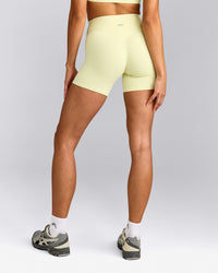 SoftMotion™ High Waisted Shorts 6" with Grey Logo | Pastel Yellow