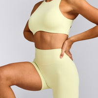 SoftMotion™ High Waisted Shorts 6" with Grey Logo | Pastel Yellow
