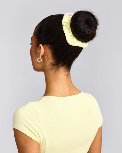 SoftMotion™ Scrunchie with Grey Logo | Pastel Yellow