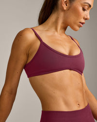 EnhanceLift™ Seamless Minimal Bralette with Grey Logo | Burnt Maroon Red
