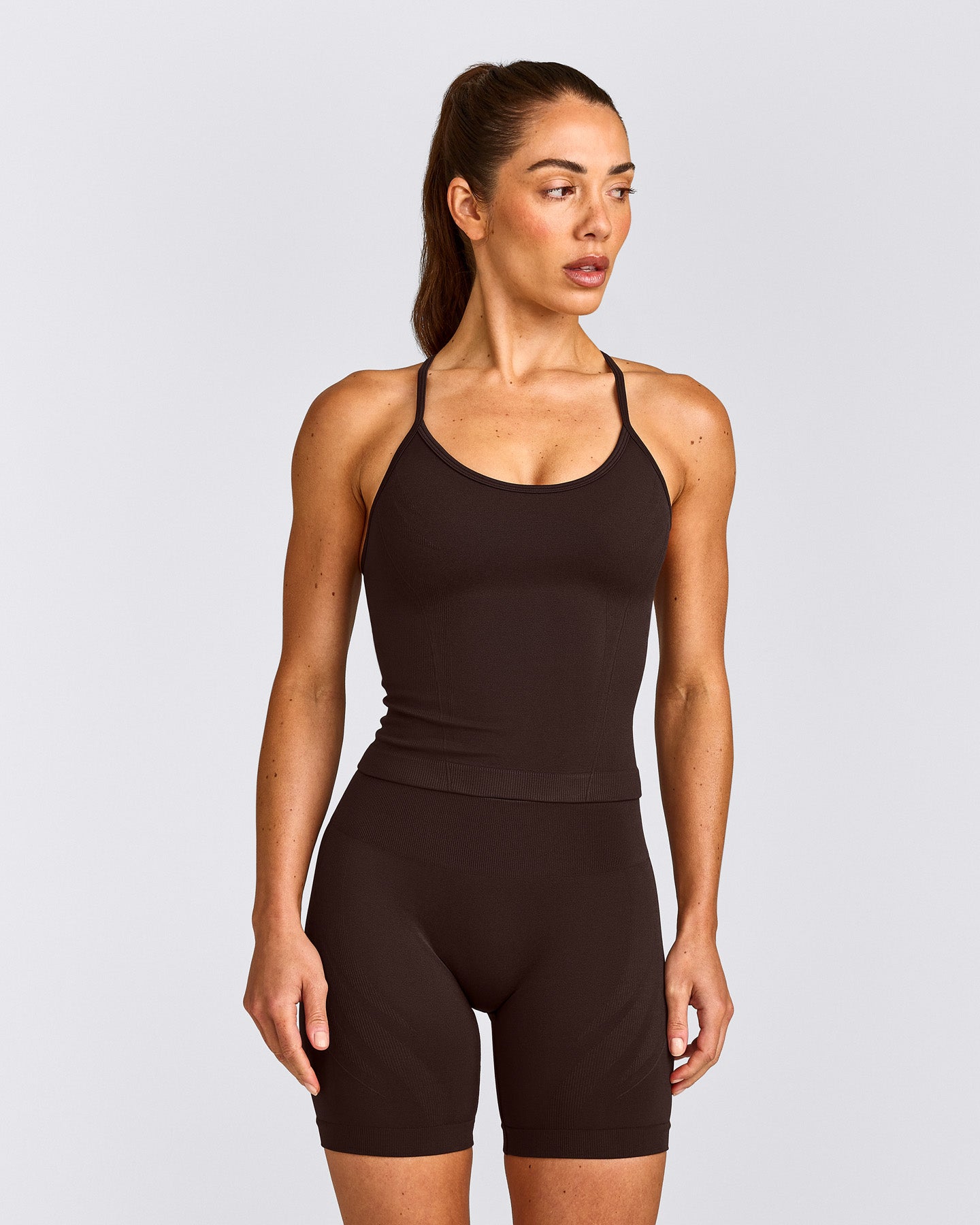 EnhanceLift™ Seamless Strappy Racer Tank Top with Built in Bra Shelf with Grey Logo | 70% Cocoa