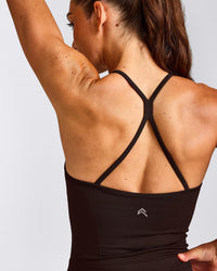 EnhanceLift™ Seamless Strappy Racer Tank Top with Built in Bra Shelf with Grey Logo | 70% Cocoa