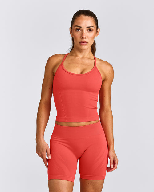 EnhanceLift™ Seamless Strappy Racer Vest with Built in Bra Shelf with Grey Logo | Dark Charged Coral