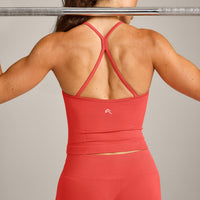 EnhanceLift™ Seamless Strappy Racer Vest with Built in Bra Shelf with Grey Logo | Dark Charged Coral