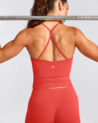 EnhanceLift™ Seamless Strappy Racer Tank Top with Built in Bra Shelf with Grey Logo | Dark Charged Coral