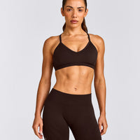 EnhanceLift™ Seamless Strappy Sports Bra with Grey Logo | 70% Cocoa