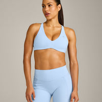 UnifiedMove™ Cross Back Sports Bra with Reflective Logo | Powdered Blue