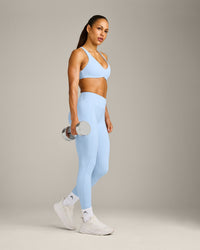 UnifiedMove™ Cross Back Sports Bra with Reflective Logo | Powdered Blue