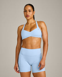 UnifiedMove™ T Back Minimal Bralette with Reflective Logo | Powdered Blue