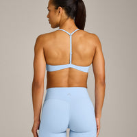 UnifiedMove™ T Back Minimal Bralette with Reflective Logo | Powdered Blue