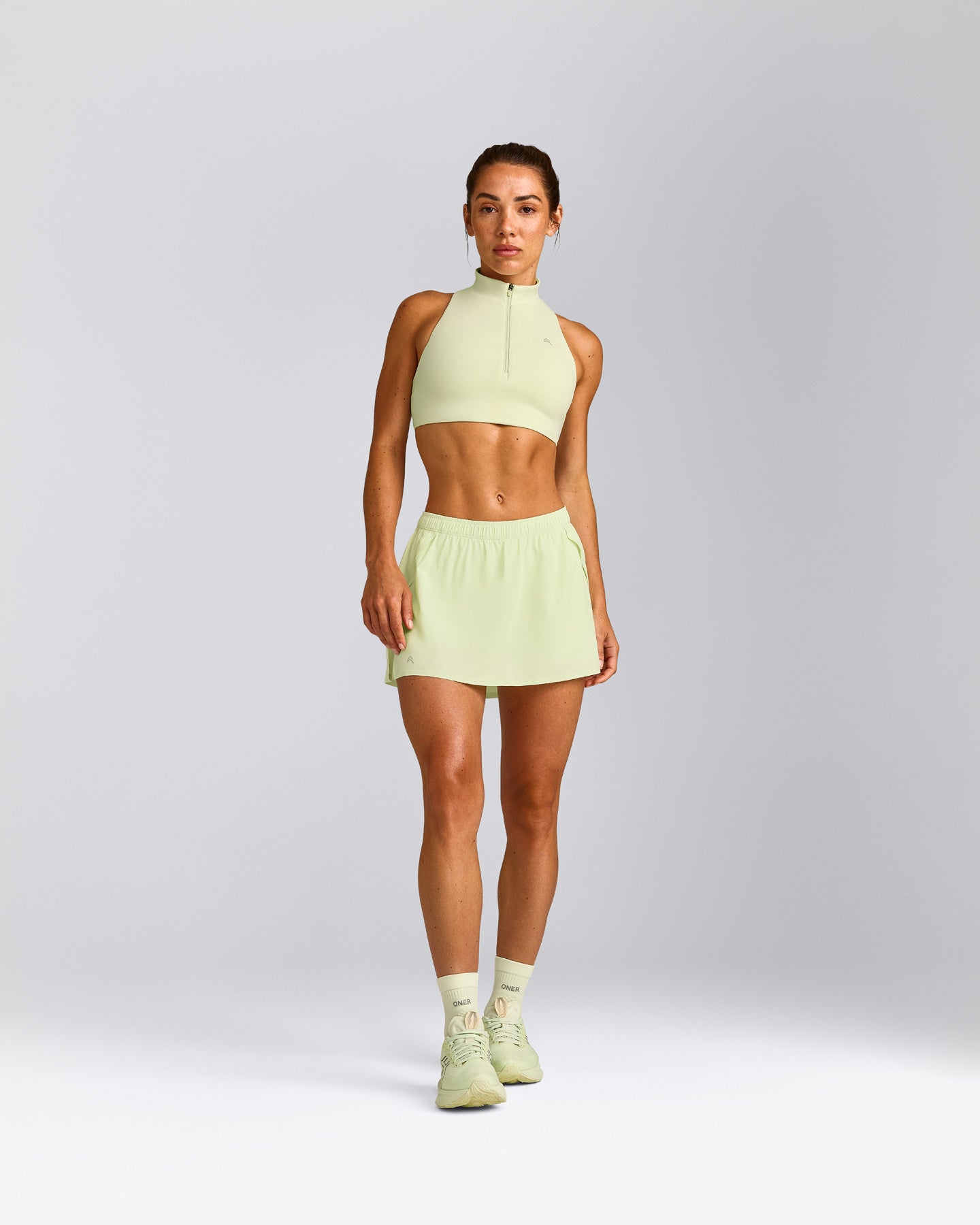 AirMove™ Skort with Pockets New Branding | Meadow Mist Green