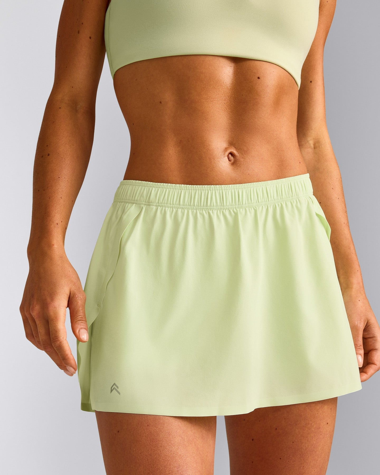 AirMove™ Skort with Pockets New Branding | Meadow Mist Green