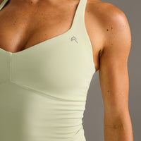 UnifiedMove™ T Back Mid Vest with Built in Bra Shelf New Branding | Meadow Mist Green
