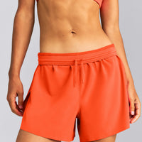 AirMove™ Lined Pocket Shorts 4" | Energy Orange