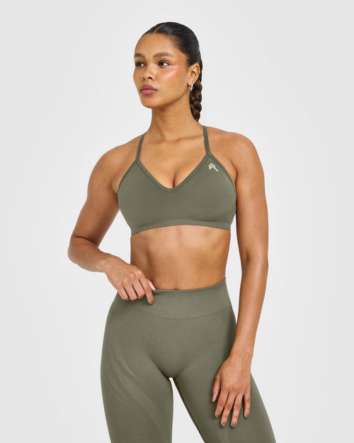 Oner Modal EnhanceLift™ Seamless Strappy Sports Bra with White Logo | Alpine Green