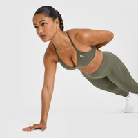 EnhanceLift™ Seamless Strappy Sports Bra with White Logo | Alpine Green