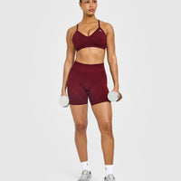 EnhanceLift™ Seamless Strappy Sports Bra with White Logo | Rosewood