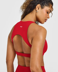 SoftMotion™ High Neck Sports Bra with White Logo | Light Toasted Red