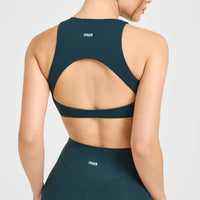 SoftMotion™ High Neck Sports Bra with White Logo | Oil Blue