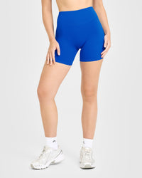 SoftMotion™ High Waisted Shorts 6" with White Logo | Light Cobalt Blue