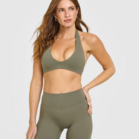 SoftMotion™ Minimal Halter Neck Bralette with White Logo | Alpine Green