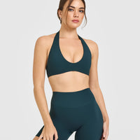 SoftMotion™ Minimal Halter Neck Bralette with White Logo | Oil Blue