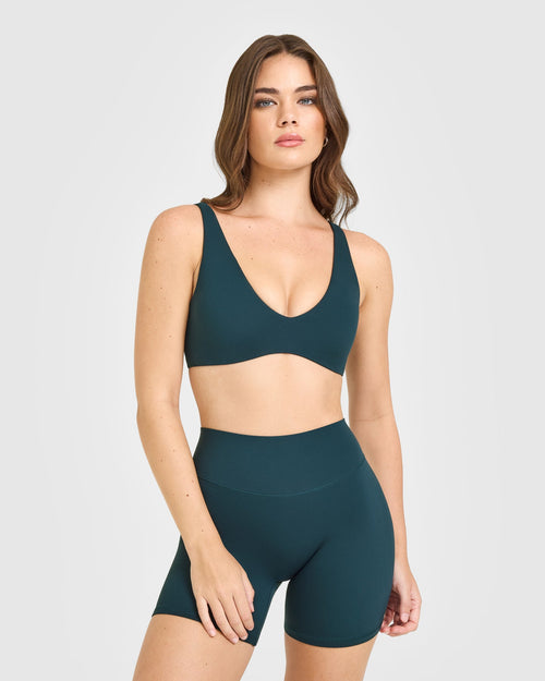 SoftMotion™ Scoop Back Bralette with White Logo | Oil Blue